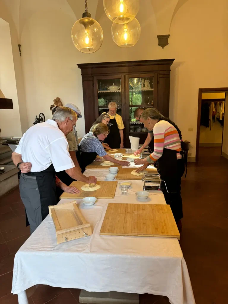 Travelers making pasta