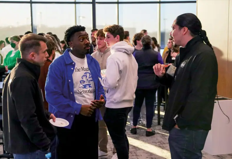 Students network at Mocktails & Mingle