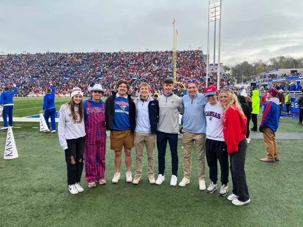 Students at the Homecoming football game
